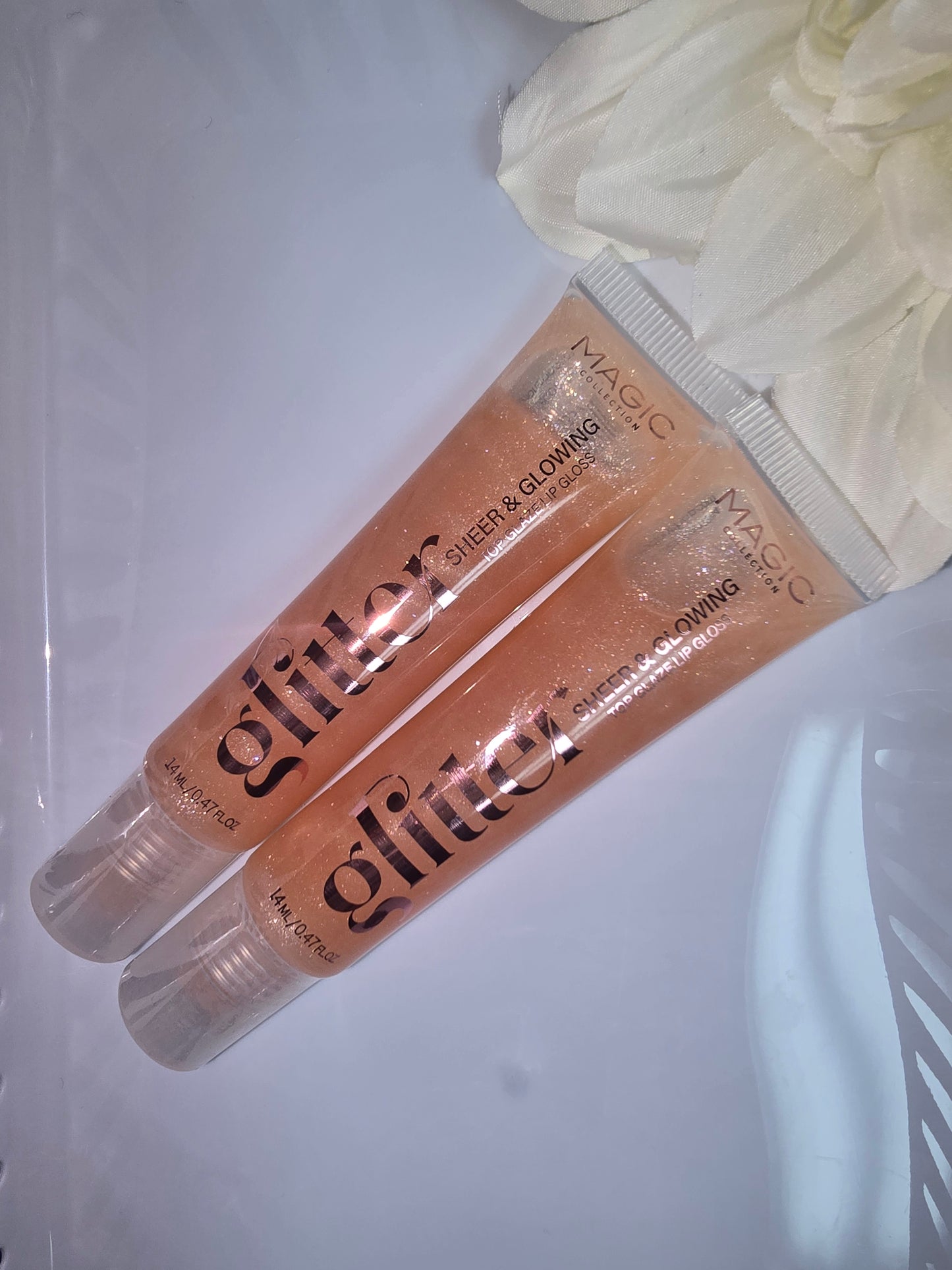 Magic Sheer & Glowing Glitter Gloss